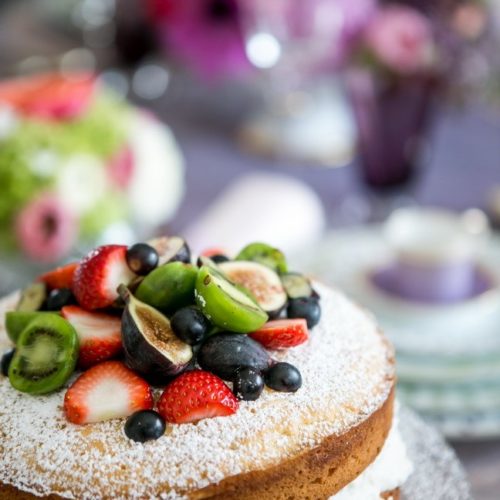 Sponge cake with cream, fruit & berries