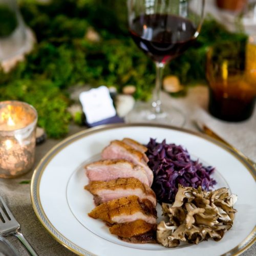 Seared duck breast with mushrooms, purple cabbage & blueberry sauce