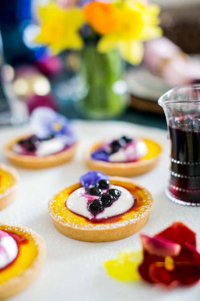 Lemon-tartlets-with-blueberry-compote-dust-with-icing-sugar.jpg