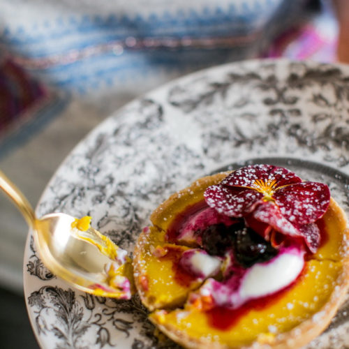 Lemon tartlets with blueberry compote